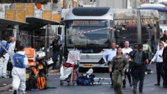 Six killed by Palestinian gunmen at Jerusalem bus stop